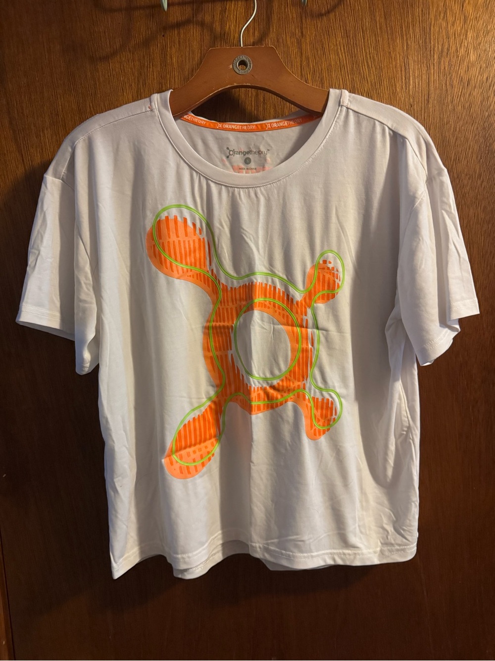 Orangetheory Boxy White Tee with Orange & Lime Graphic